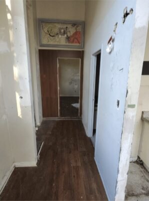 Empty apartment hallway ready for a new tenant